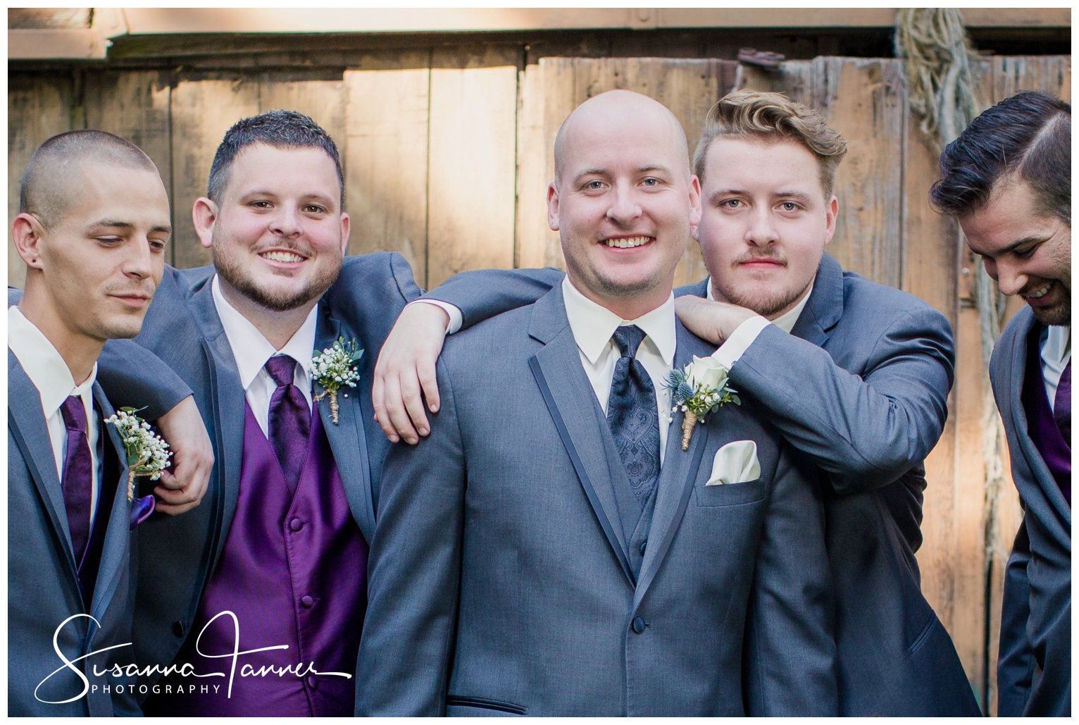 Indianapolis Outdoor Wedding, close up of groomsmen. One has arm around groom.