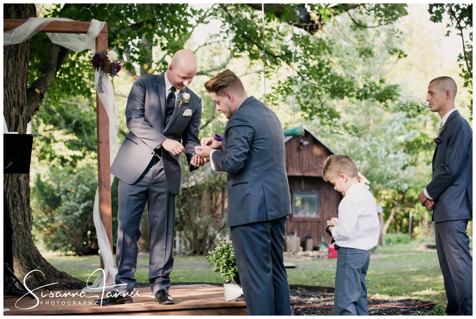Indianapolis Outdoor Wedding, best man handing groom the ring