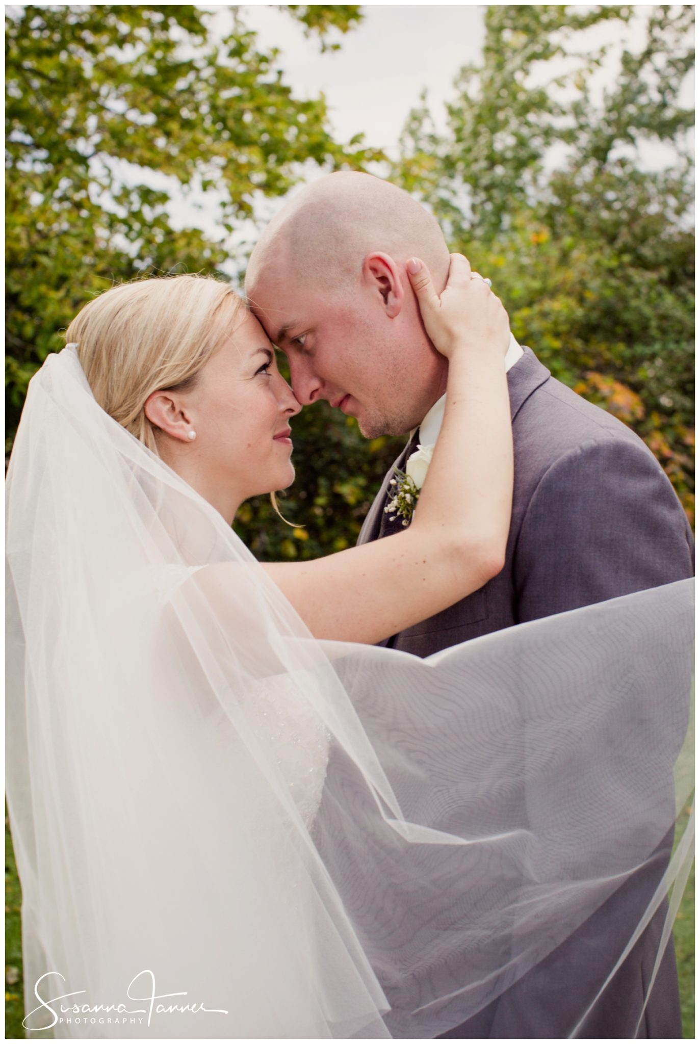 Indianapolis Outdoor Wedding, bride and groom portraits-bride hand on back of groom's head