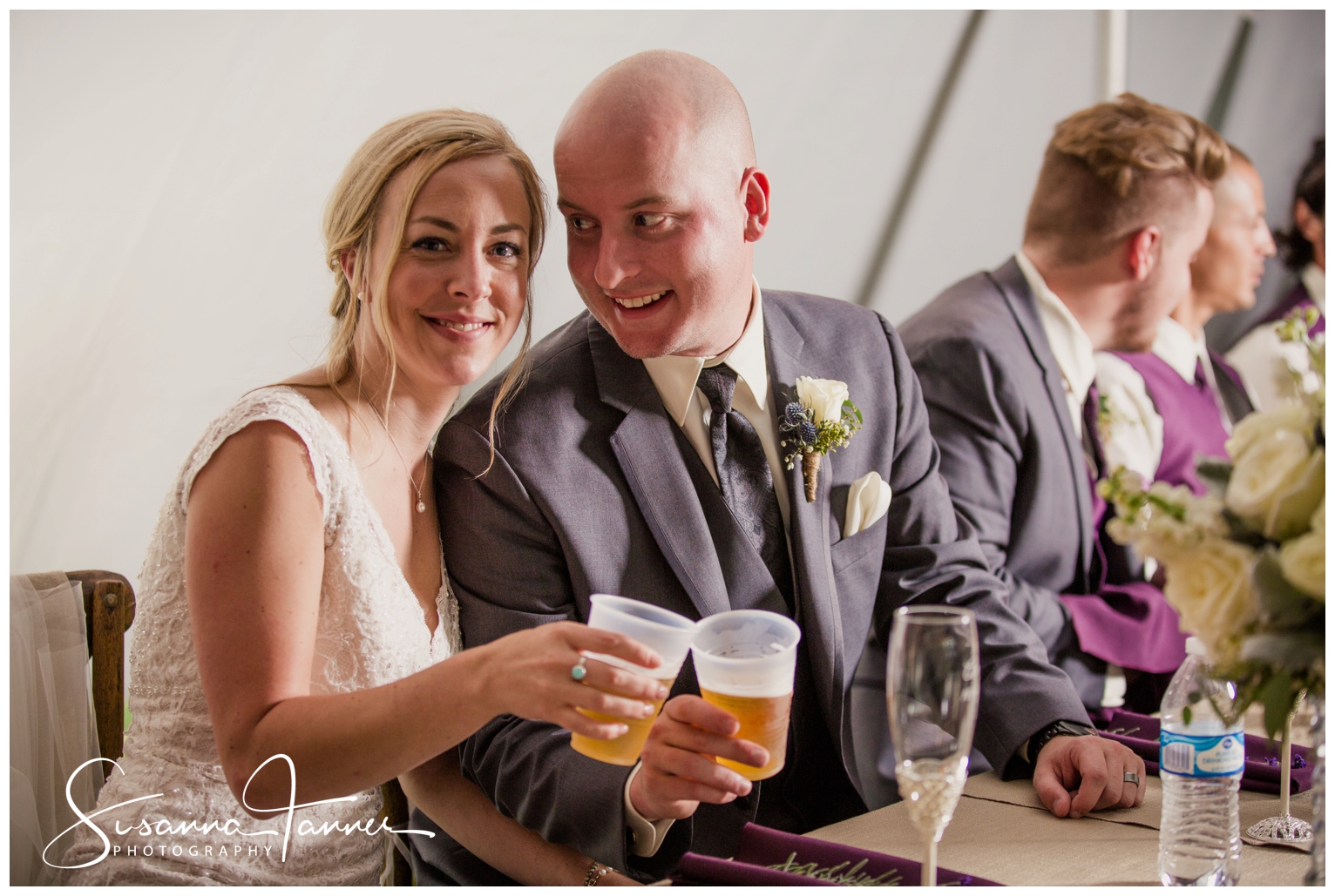 Indianapolis Outdoor Wedding, bride and groom toasting with beer cups