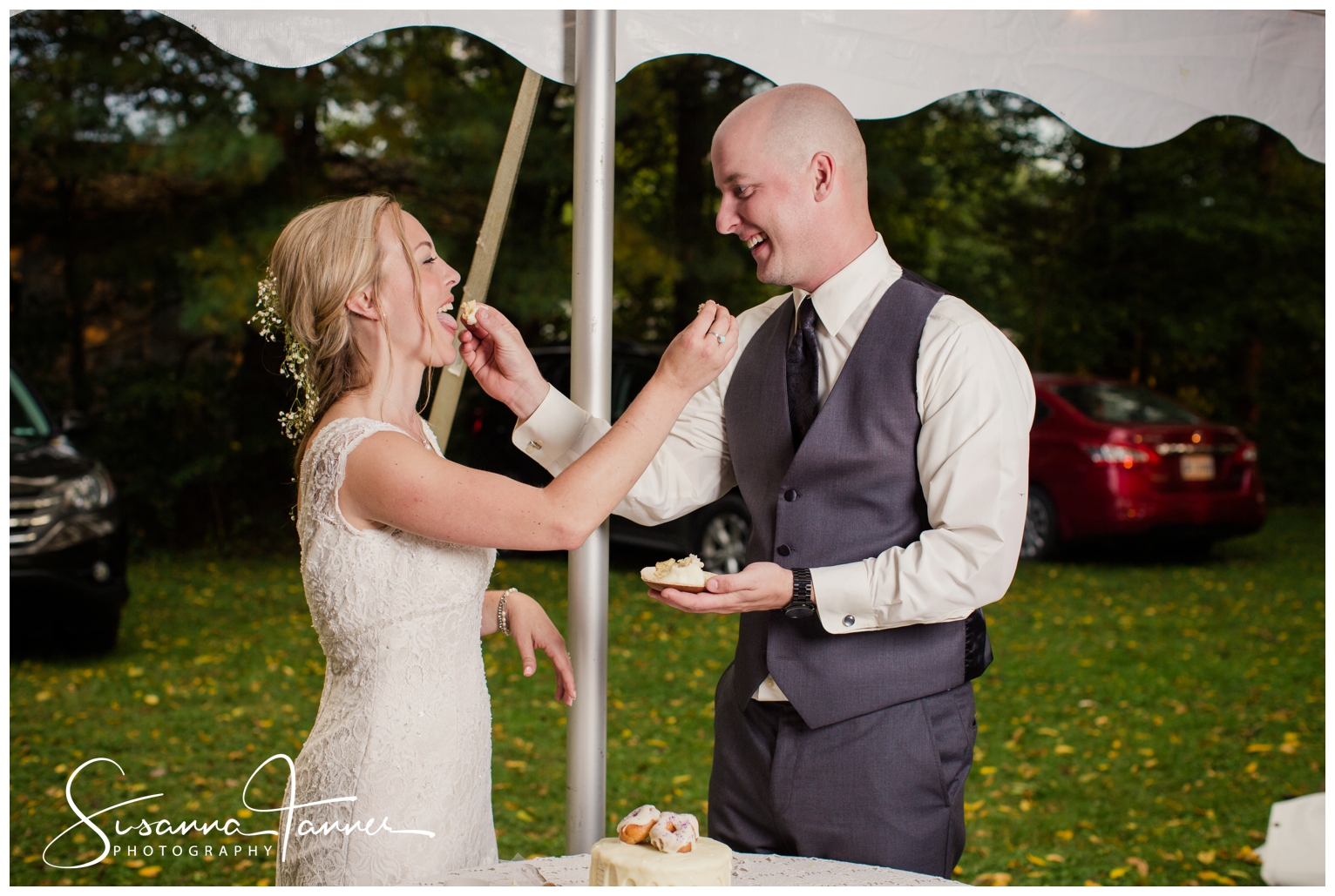 Indianapolis Outdoor Wedding, bride and groom feeding each other cake