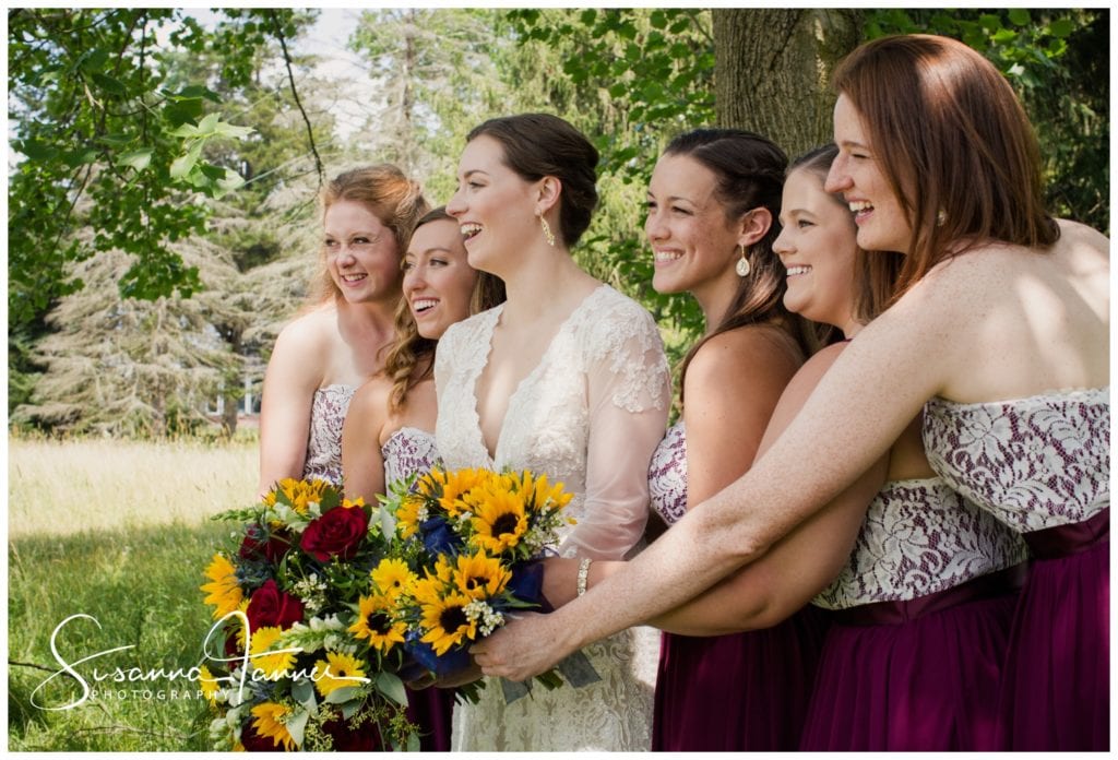 Cope Environmental Wedding Photography, Richmond Indiana, bride with bridesmaids holding their bouquets