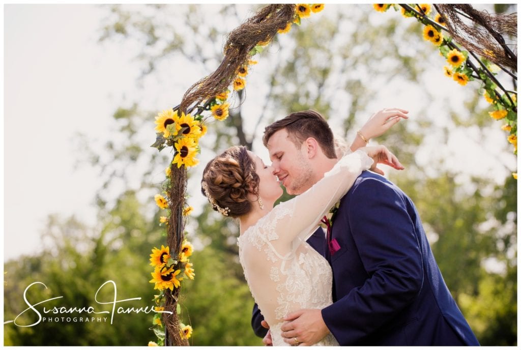 Cope Environmental Wedding Photography, Richmond Indiana, bride and groom kiss to seal the deal