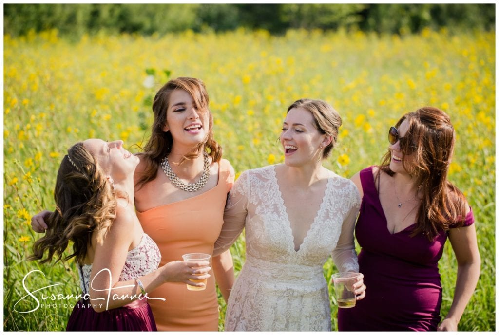 Cope Environmental Wedding Photography, Richmond Indiana, bride laughing with girl friends.