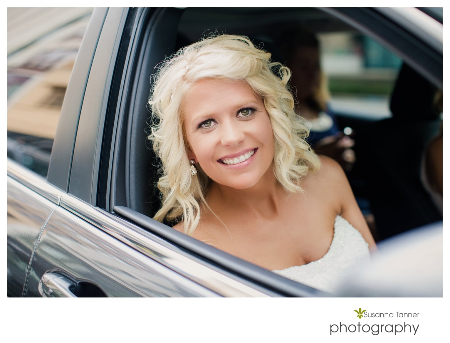 Indiana State Museum wedding photography, bride looking out car window leaving Conrad Hotel