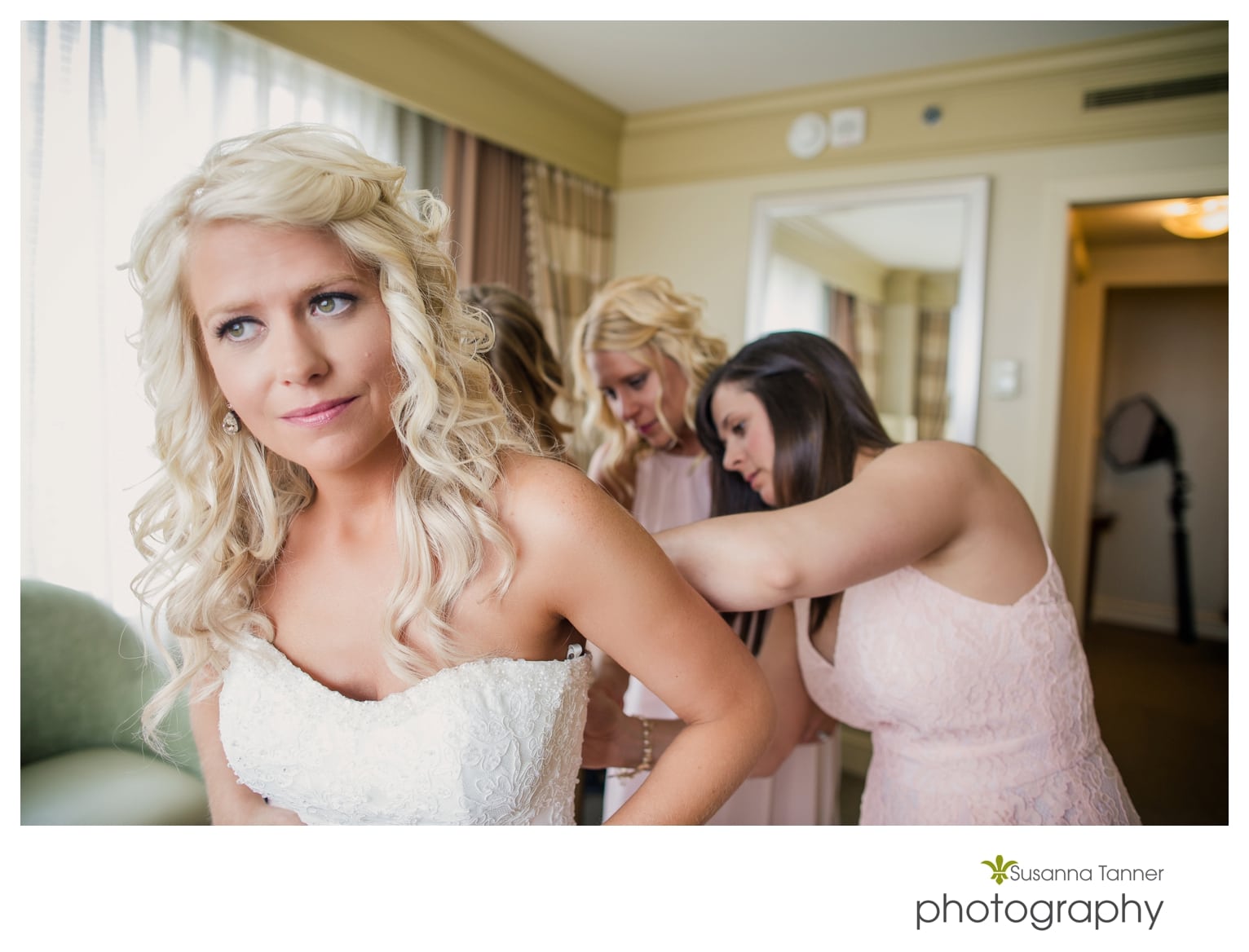 Indiana State Museum wedding photography, bridesmaids zipping wedding dress