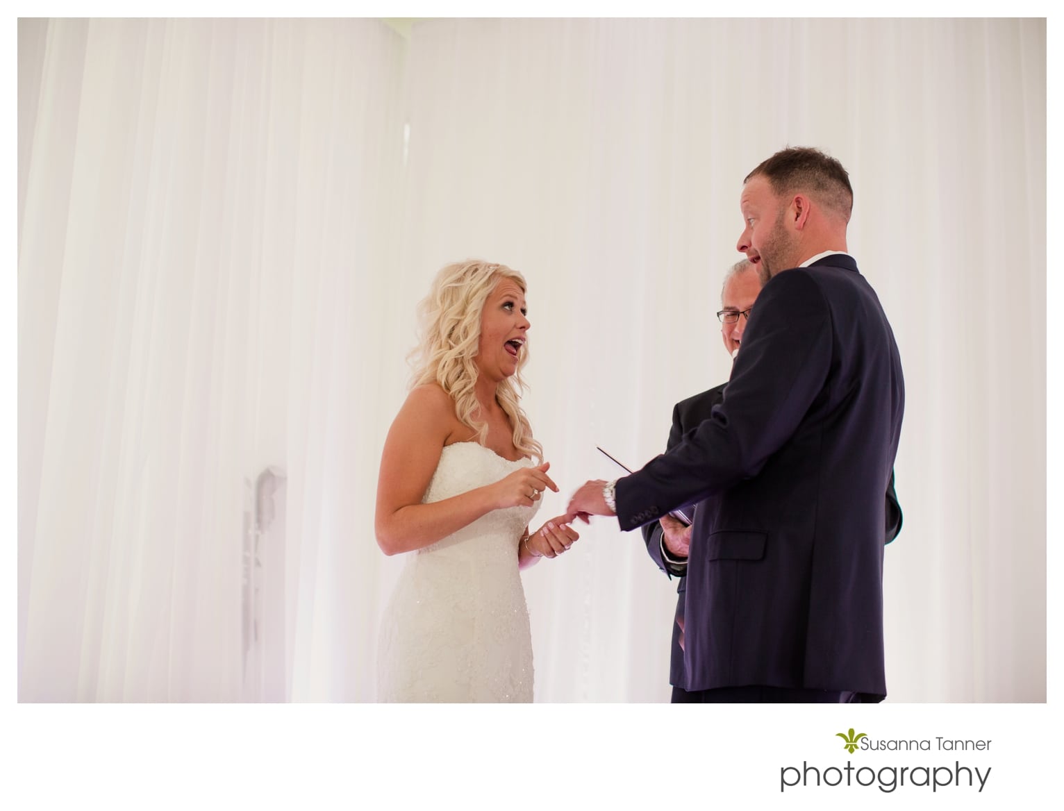 Indiana State Museum wedding photography, bride putting ring on groom's finger