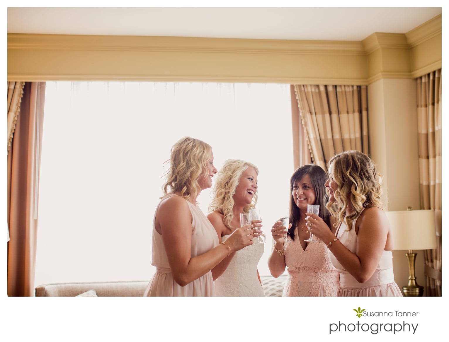 Indiana State Museum wedding photography, bride and bridesmaids drinking champagne