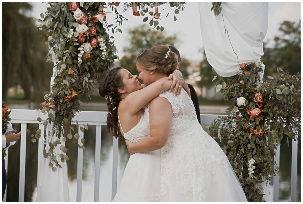 gay wedding, west central Ohio, brides happily hug after being pronounced married