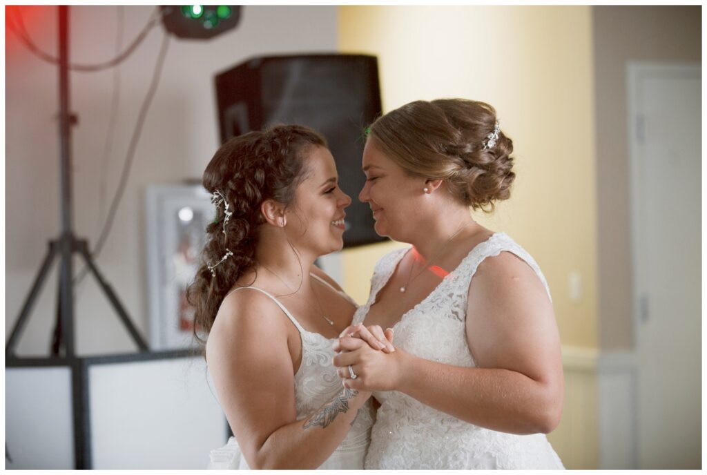 gay wedding, west central Ohio, brides lovingly look at each other during first dance