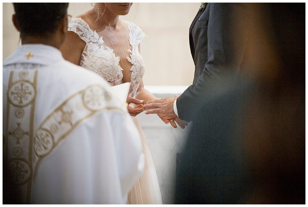 outdoor wedding venue, Richmond, IN, bride puts ring on groom's finger